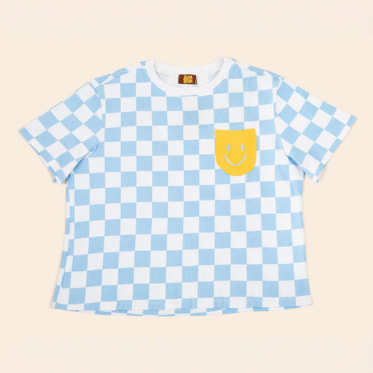 White and blue Checkered t-shirt with a yellow smiley face pocket on a beige background | SUNBEAN