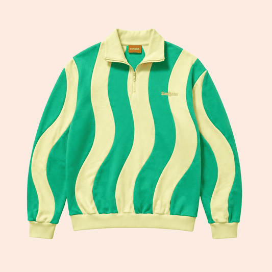 Green and yellow Sunbean striped quartert zip sweat shirt on a beige background